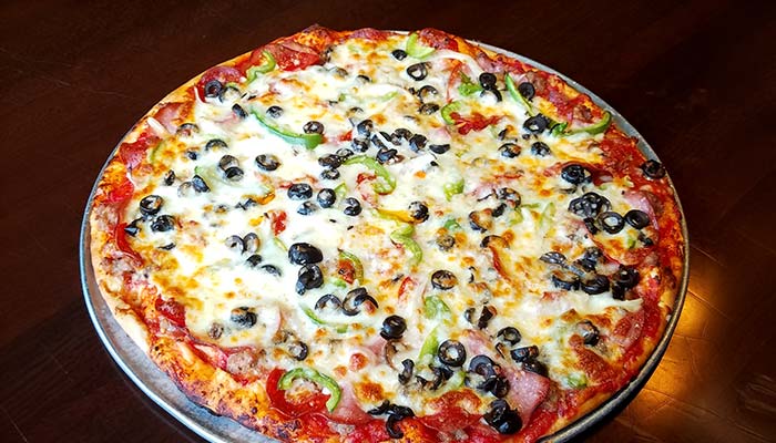 Frankie's Chicago Style Pizza restaurant in Basswood Grove, MN serves the best monster thin crust pizza